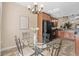 Breakfast nook with a glass table and chairs, conveniently near the kitchen at 822 Foxtail Dr. # 822, Longs, SC 29568
