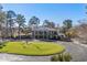 Impressive clubhouse featuring classic architecture, manicured lawns, and an inviting entrance, ideal for community gatherings at 822 Foxtail Dr. # 822, Longs, SC 29568