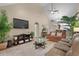 Open living area with vaulted ceiling, modern furniture, and views into dining area at 822 Foxtail Dr. # 822, Longs, SC 29568