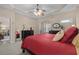 Bright, spacious main bedroom with soft carpet, a ceiling fan, and neutral paint at 822 Foxtail Dr. # 822, Longs, SC 29568