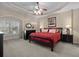 Spacious main bedroom featuring a tray ceiling, neutral tones, and ample natural light at 822 Foxtail Dr. # 822, Longs, SC 29568