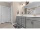 Bathroom with double sink vanity, shower, and neutral tones provides a soothing, spa-like experience at 900 Pelagic Loop, Myrtle Beach, SC 29579