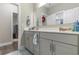 Bright bathroom featuring a double vanity and a coastal theme, offering a serene and inviting space at 900 Pelagic Loop, Myrtle Beach, SC 29579