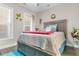 Bright bedroom with a blue rug and butterfly decor offering a peaceful and playful atmosphere at 900 Pelagic Loop, Myrtle Beach, SC 29579