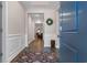 Inviting foyer with hardwood floors, elegant wainscoting, and a clear view into the living spaces at 900 Pelagic Loop, Myrtle Beach, SC 29579