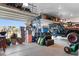Spacious garage with epoxy flooring, overhead storage, and a black truck at 900 Pelagic Loop, Myrtle Beach, SC 29579