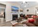 Comfortable living room with a cozy fireplace, perfect for relaxing and entertaining guests at 900 Pelagic Loop, Myrtle Beach, SC 29579