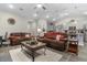 Inviting living room with comfortable seating, a ceiling fan, and a view into the adjacent kitchen at 900 Pelagic Loop, Myrtle Beach, SC 29579