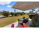 Covered patio with outdoor seating and a black table at 900 Pelagic Loop, Myrtle Beach, SC 29579