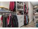 Organized walk-in closet featuring ample shelving, drawers and hanging storage for optimal storage solutions at 900 Pelagic Loop, Myrtle Beach, SC 29579