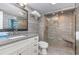 Beautiful bathroom featuring a glass-enclosed shower and granite countertop vanity with soft-close drawers at 9550 Shore Dr. # 231, Myrtle Beach, SC 29572