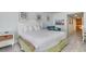 Cozy bedroom features comfortable bed, seating area and neutral decor at 9550 Shore Dr. # 231, Myrtle Beach, SC 29572