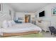 Cozy bedroom featuring a queen bed, flat-screen TV, and soothing, coastal-inspired decor at 9550 Shore Dr. # 231, Myrtle Beach, SC 29572