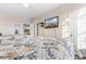 Bedroom features two beds and mounted TV, providing a relaxed atmosphere at 9754 Leyland Dr. # 11, Myrtle Beach, SC 29572