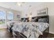 Spacious bedroom with two beds, ample natural light, and stylish decor at 9754 Leyland Dr. # 11, Myrtle Beach, SC 29572