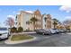Well-maintained condo complex with manicured landscaping and ample parking spaces at 9754 Leyland Dr. # 11, Myrtle Beach, SC 29572