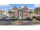 Attractive condo complex with brick and siding exterior and well-maintained landscaping at 9754 Leyland Dr. # 11, Myrtle Beach, SC 29572