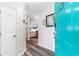 Bright foyer leading to an open-concept living area with hardwood floors at 9754 Leyland Dr. # 11, Myrtle Beach, SC 29572