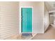 Inviting entryway featuring a teal door with a welcoming 'Beach' doormat at 9754 Leyland Dr. # 11, Myrtle Beach, SC 29572