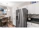Well-lit kitchen features stainless steel appliances, granite counters, and modern backsplash at 9754 Leyland Dr. # 11, Myrtle Beach, SC 29572