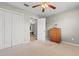 Bedroom with neutral walls and carpet with a large closet and view to another room at 1202 Formby Ct., Myrtle Beach, SC 29588