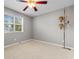 Bedroom featuring neutral walls and carpet, a ceiling fan, and a window providing natural light at 1202 Formby Ct., Myrtle Beach, SC 29588