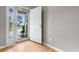 Bright foyer featuring a glass door and sidelight with wood flooring at 1202 Formby Ct., Myrtle Beach, SC 29588