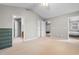 Bright main bedroom with neutral carpet and ceiling fan and a large closet and ensuite bath at 1202 Formby Ct., Myrtle Beach, SC 29588
