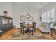 Lovely dining room with decorative chandelier, hardwood floors, and natural light at 133 Hartwell Dr., Little River, SC 29566