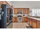 Well-equipped kitchen with stainless steel appliances and ample counter space at 133 Hartwell Dr., Little River, SC 29566
