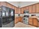 Modern kitchen features stainless steel appliances and plenty of cabinet space at 133 Hartwell Dr., Little River, SC 29566