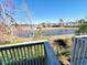 Balcony view of the tranquil pond with greenery and residential houses in the background at 1356 Glenns Bay Rd. # 201B, Surfside Beach, SC 29575