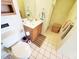 Bathroom features single sink vanity, toilet, and built in storage shelf at 1356 Glenns Bay Rd. # 201B, Surfside Beach, SC 29575