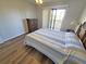 Bright bedroom with access to a private balcony and natural light streaming through sliding glass doors at 1356 Glenns Bay Rd. # 201B, Surfside Beach, SC 29575