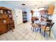 Dining area with tile floors and adjacent to kitchen at 1356 Glenns Bay Rd. # 201B, Surfside Beach, SC 29575