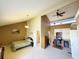 Spacious main bedroom with a high ceiling, dedicated office space, and ensuite bathroom at 1356 Glenns Bay Rd. # 201B, Surfside Beach, SC 29575
