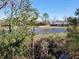 Serene water view surrounded by lush foliage offers a tranquil retreat at 1356 Glenns Bay Rd. # 201B, Surfside Beach, SC 29575