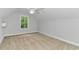 Bedroom featuring neutral carpet, white trim, ceiling fan, and a window at 19 Coventry Pl., Pawleys Island, SC 29585