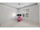 Bright bedroom with natural light, carpeted floors, and a ceiling fan at 192 Berkshire Loop, Pawleys Island, SC 29585