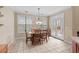 Cozy breakfast nook with bright lighting, table and chairs at 192 Berkshire Loop, Pawleys Island, SC 29585