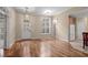Foyer with elegant front door, hardwood floors, and ample natural light at 192 Berkshire Loop, Pawleys Island, SC 29585