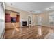 Inviting living room featuring a cozy fireplace, wood floors and classic trim at 192 Berkshire Loop, Pawleys Island, SC 29585