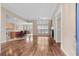Open-concept living area, kitchen, and dining room with hardwood flooring at 192 Berkshire Loop, Pawleys Island, SC 29585