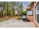 Spacious backyard patio with a gas grill, perfect for outdoor cooking and entertaining at 192 Berkshire Loop, Pawleys Island, SC 29585