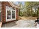 Outdoor patio with double french doors offering access to the backyard at 192 Berkshire Loop, Pawleys Island, SC 29585