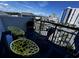 Relaxing balcony with stylish chairs and a vibrant cityscape backdrop at 2001 S Ocean Blvd. # 621, Myrtle Beach, SC 29577