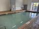 Indoor swimming pool featuring shallow water, basketball hoop and a safety sign at 2001 S Ocean Blvd. # 621, Myrtle Beach, SC 29577