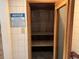 Dry sauna featuring wood slats and a sign with rules at 2001 S Ocean Blvd. # 621, Myrtle Beach, SC 29577