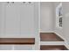 Entryway features a built-in bench and coat rack with wood-look flooring at 204 Leaflet Loop, Pawleys Island, SC 29585