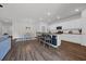 Spacious kitchen features a center island with bar seating, stainless appliances, and an adjacent dining area at 204 Leaflet Loop, Pawleys Island, SC 29585